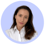 A person with long brown hair, wearing a white shirt, is looking directly at the camera. The background is a bright blue circle.